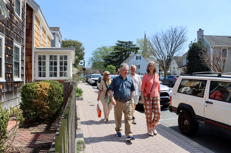 Netherlands Ambassador Birgitta Tazelaar, right, walks past some of Lewes’ historic homes on Second Street. Along with her on the tour are (l-r) Lewes Mayor Amy Marasco, Lewes in Bloom Co-chair Ed Zygmonski, and the ambassador’s husband, Mark Singleton.